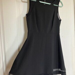 Cute black dress with sheer trim